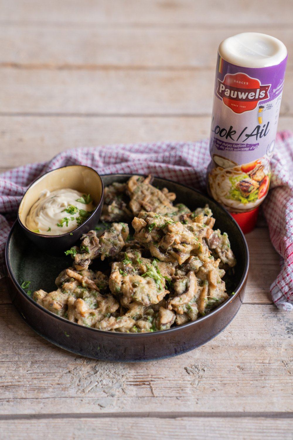 Beignets van champignons met looksaus