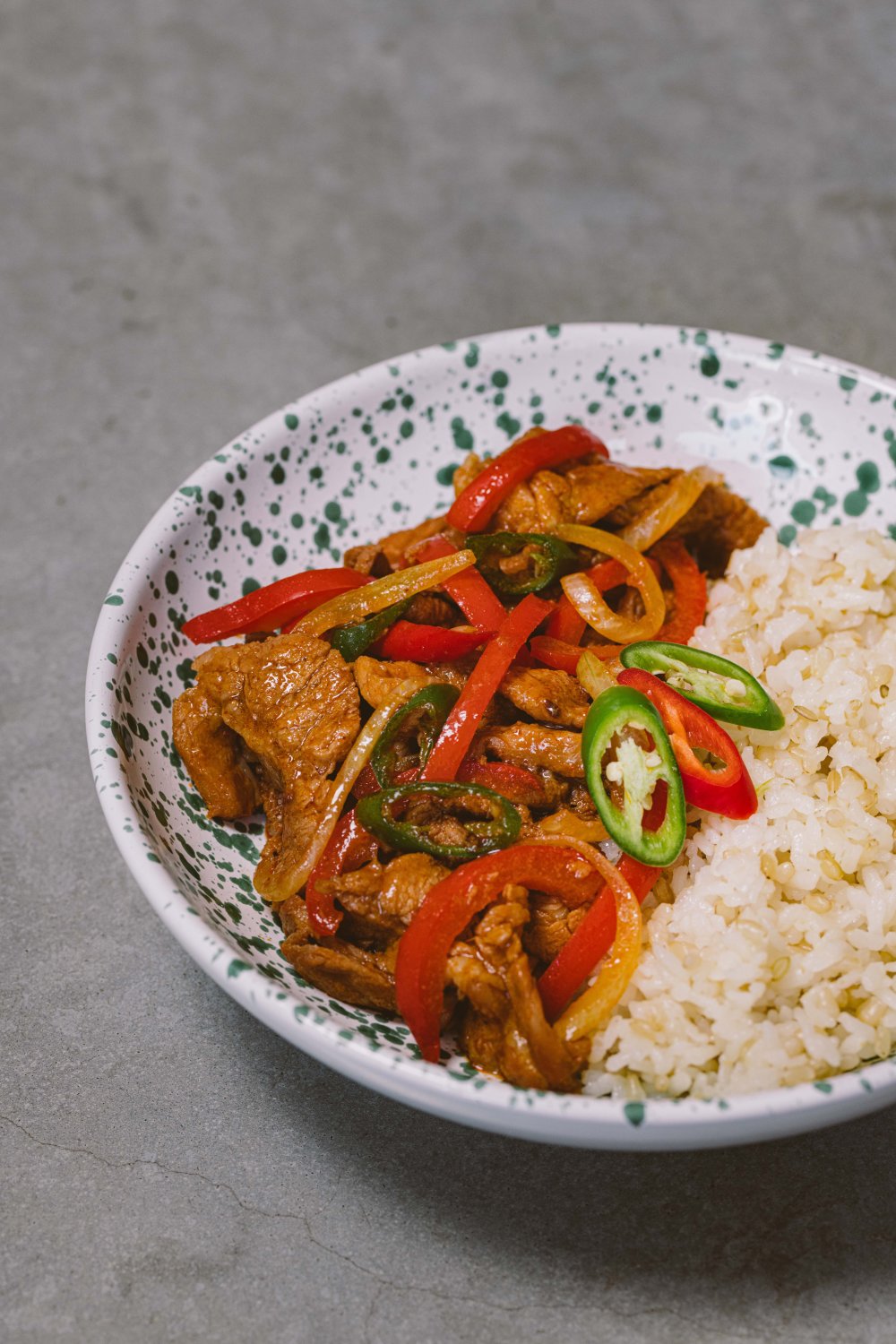 Gebakken varkenslapjes met paprika