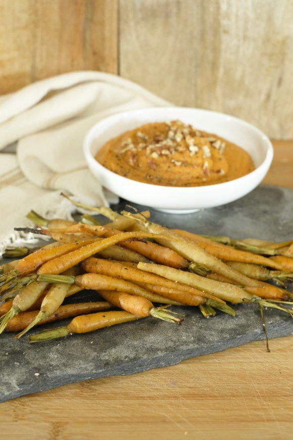 Crème van zoete aardappel met worteltjes gegaard in koffiegruis